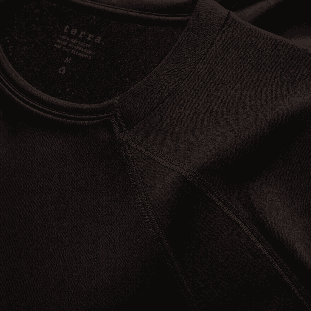 Seam detail of recycled polyester athletic shirt showing clean stitching